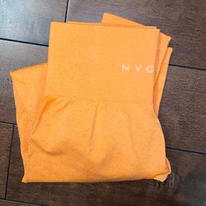 Brand new NVGTN leggings orange size S fits XS as well